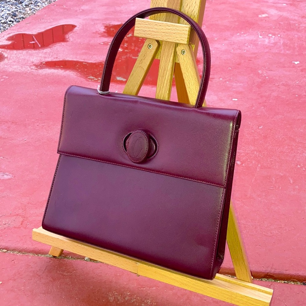 Authentic Cartier top handle bag.